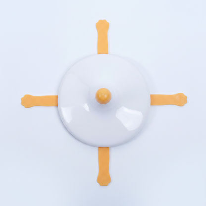 Electric rotating cat toy white disc with four orange arms top-down view on white background